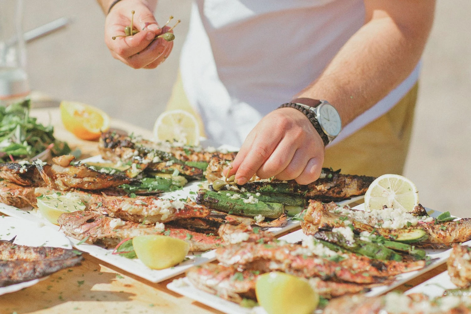 a person preparing food on a table