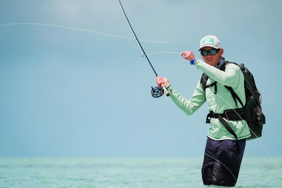 a man fishing in the water