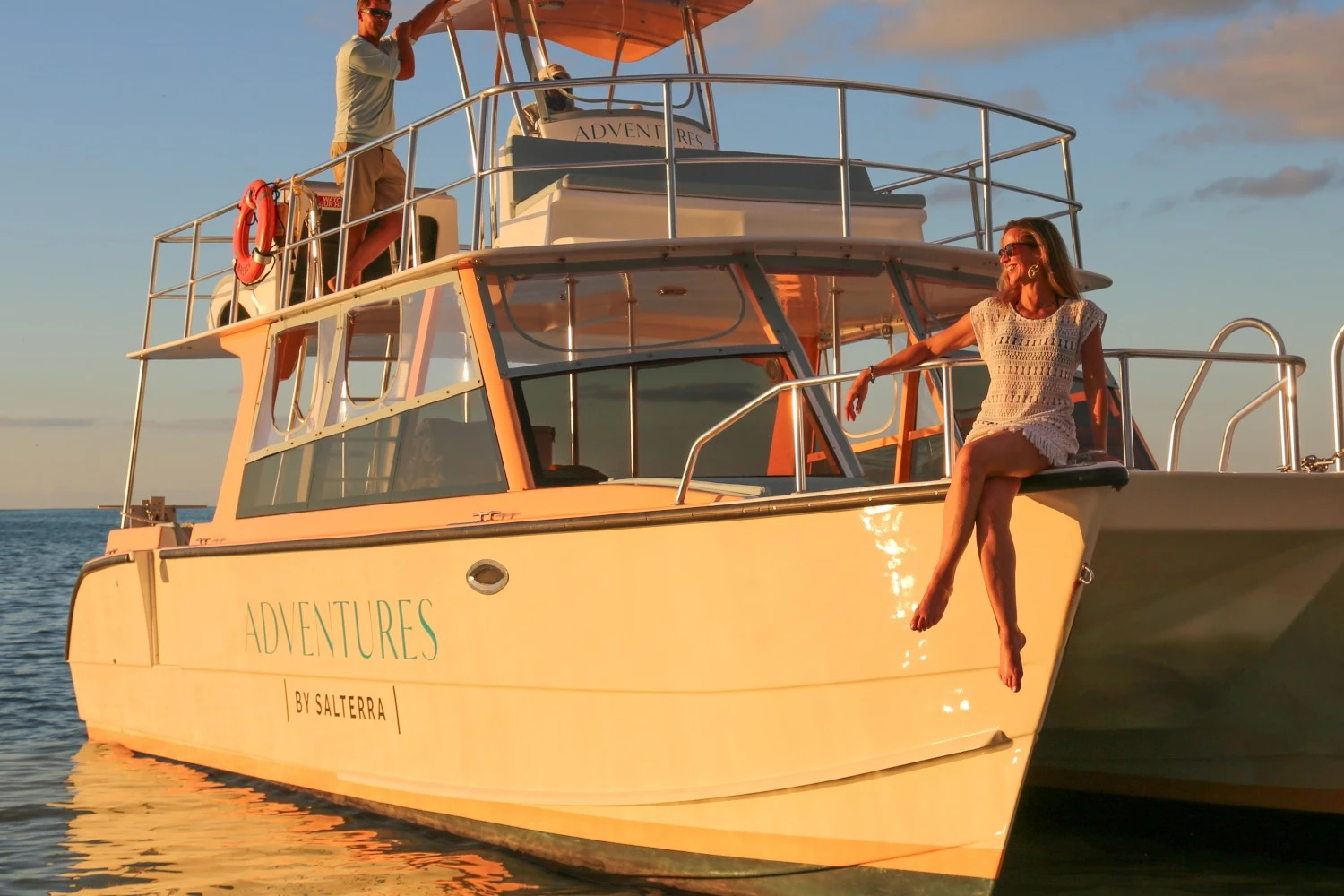 a man and woman on a boat