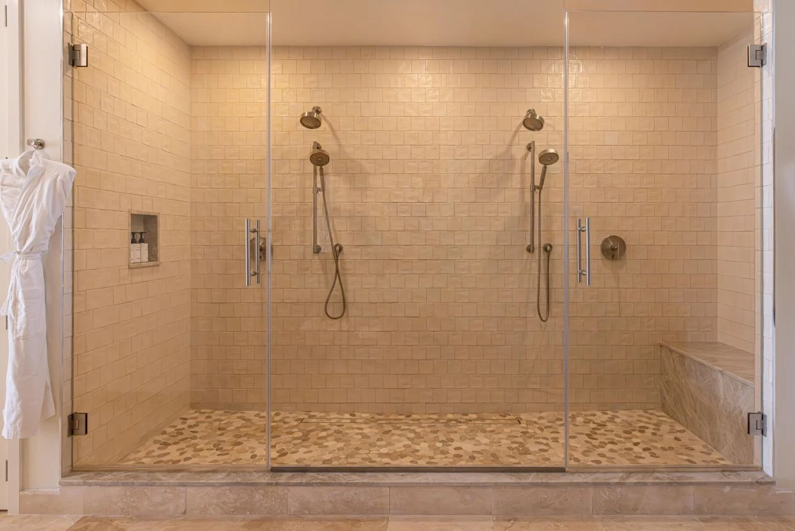 a shower with glass doors