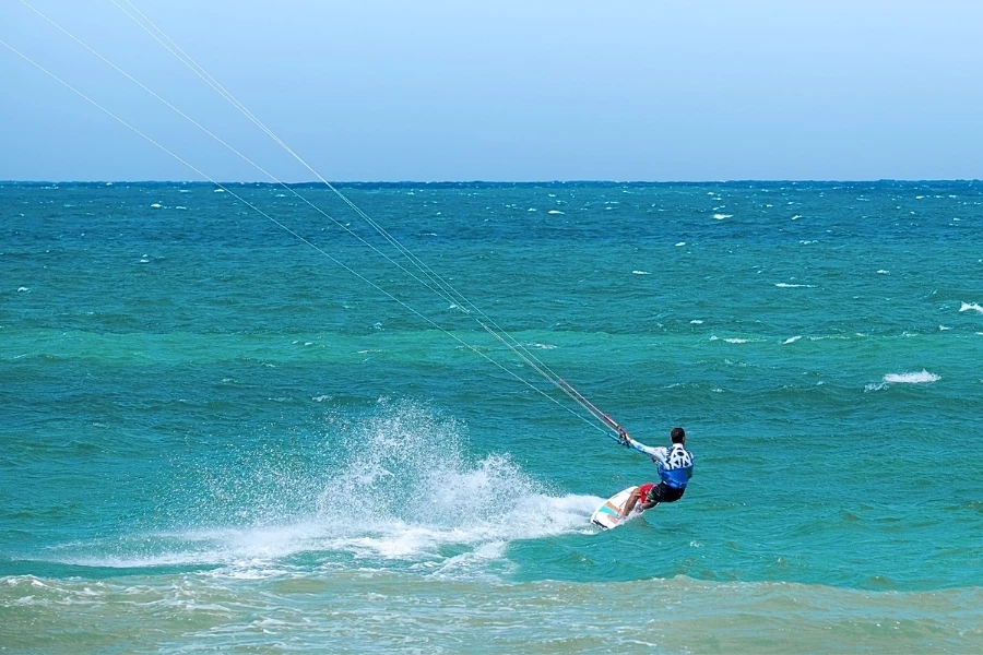 a person kite surfing in the ocean