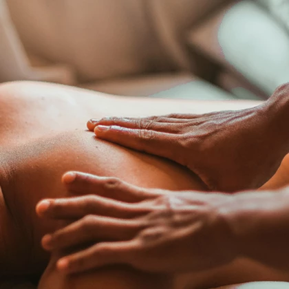 a person receiving a back massage