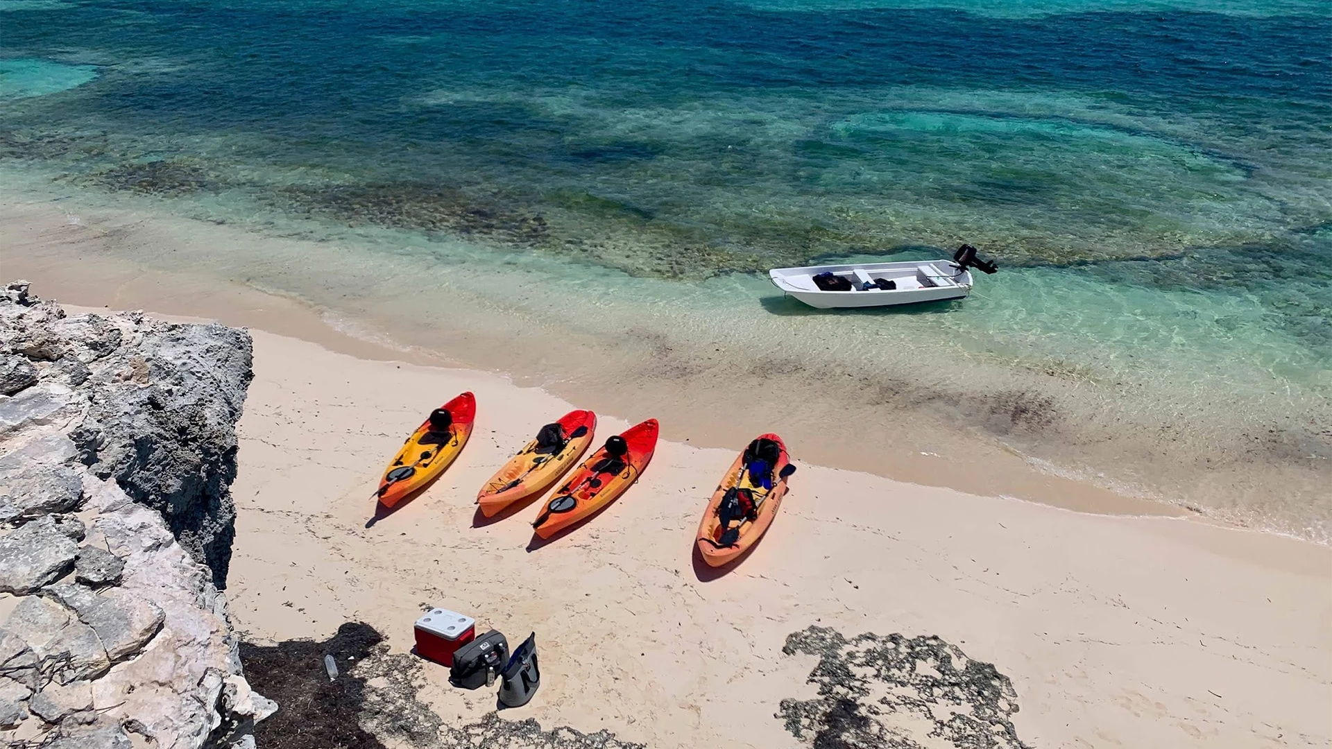 a group of kayaks on a beach