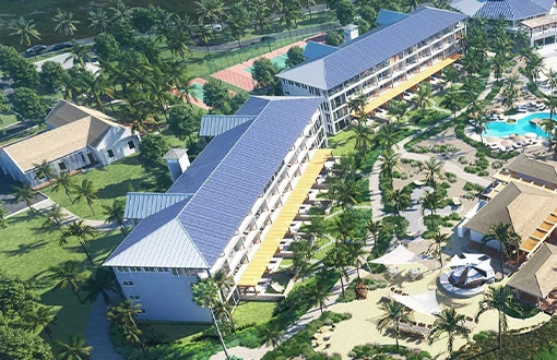 a building with a pool and palm trees
