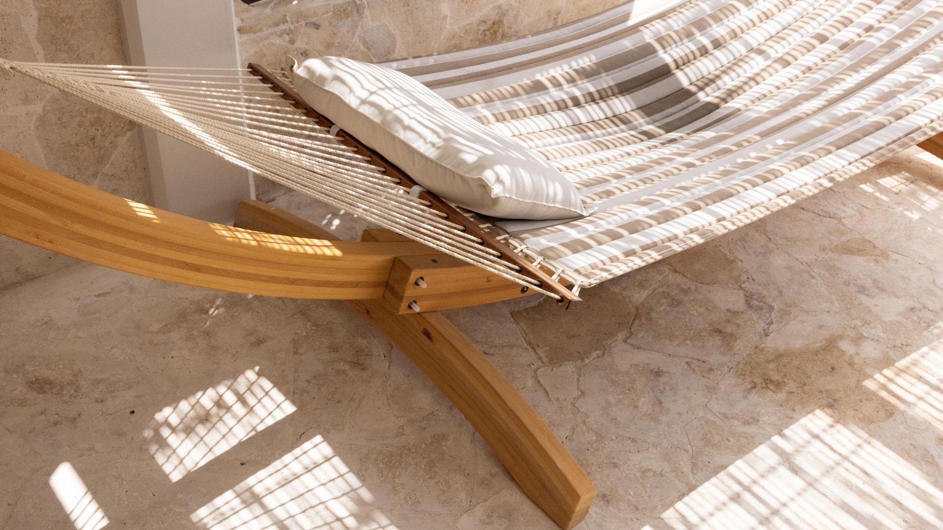a hammock with a pillow on it