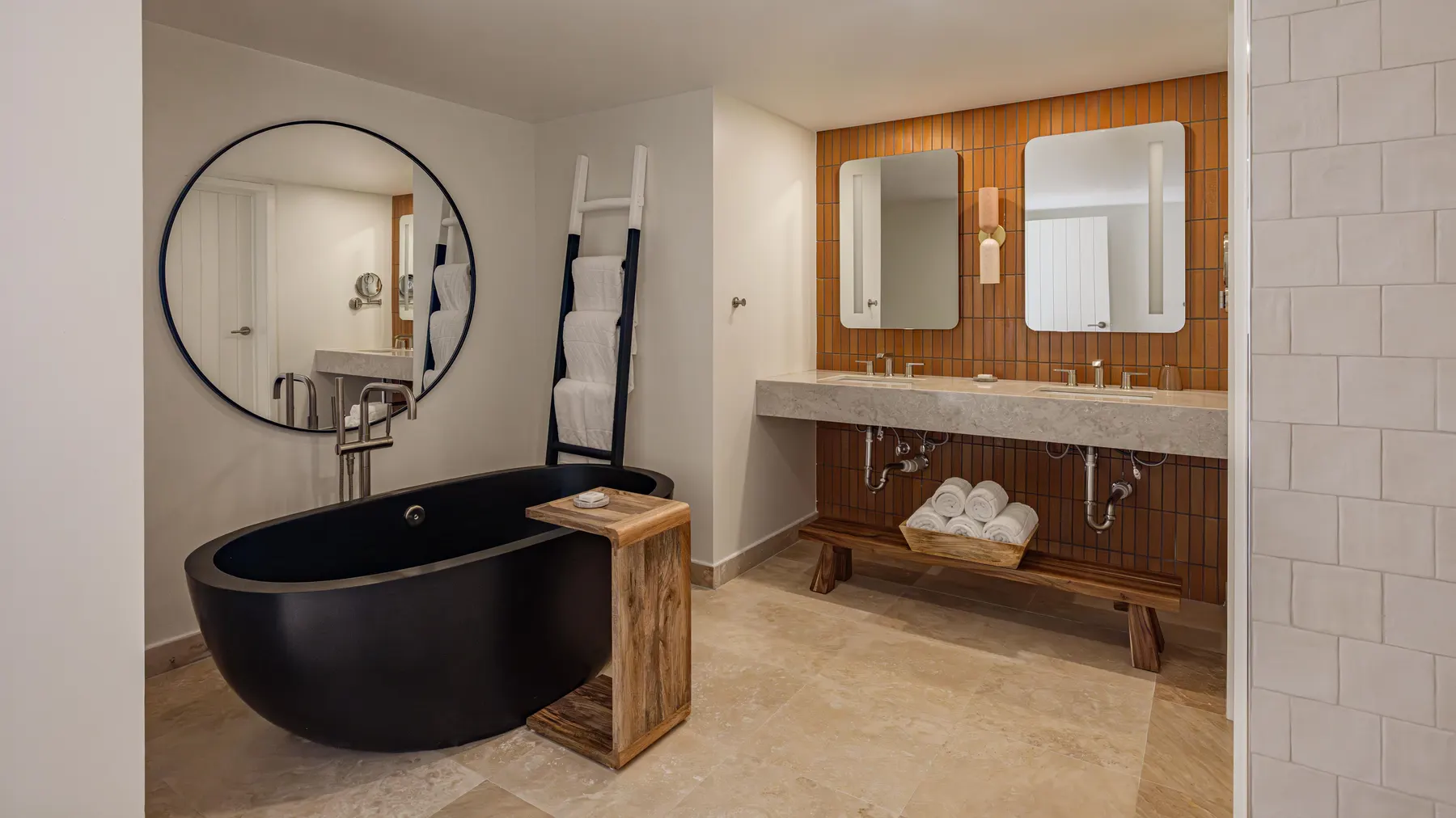 a bathroom with a tub and a sink